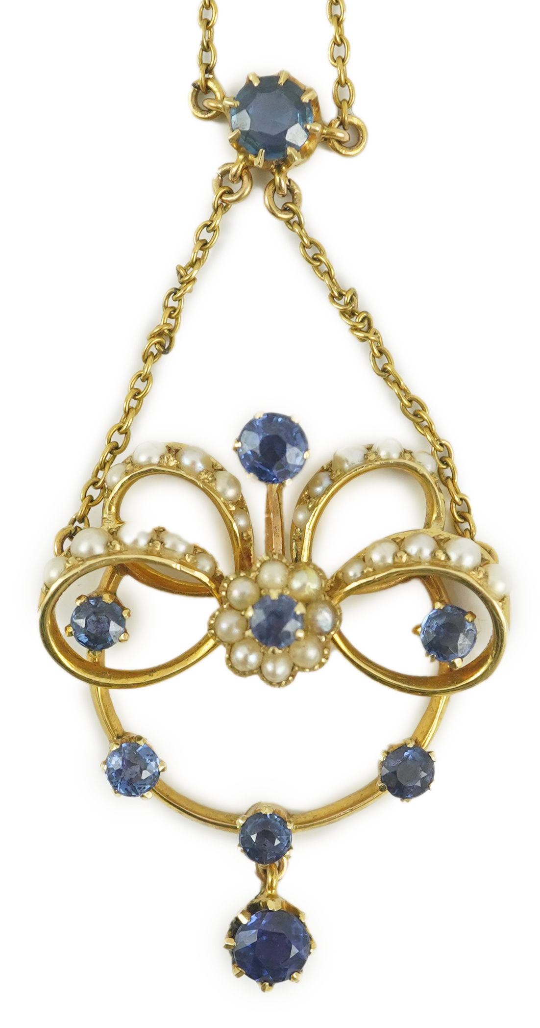 A mid 20th century gold, sapphire and seed pearl cluster set drop pendant necklace